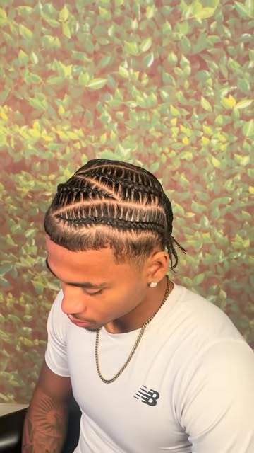 Clean geometric cornrows styled by StylezbyDaKing